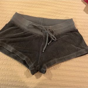 Hard tail low rise dark green terry shorts.